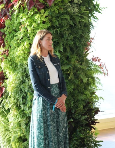 Catherine Nichols speaking at Easterseals' 100th anniversary event in Salesforce Tower